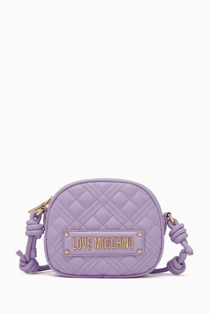 

Small Oval-shaped Quilted Crossbody Bag in Faux Leather, Purple