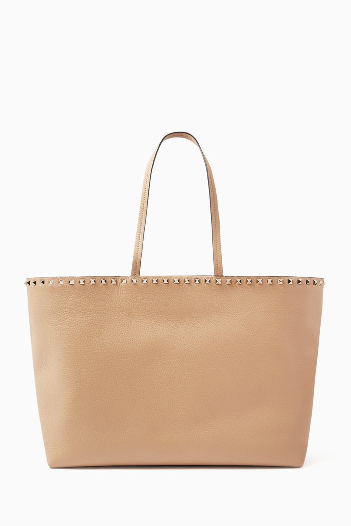 

Valentino Garavani Medium Grainy Rockstud Tote Bag in Leather, Brown