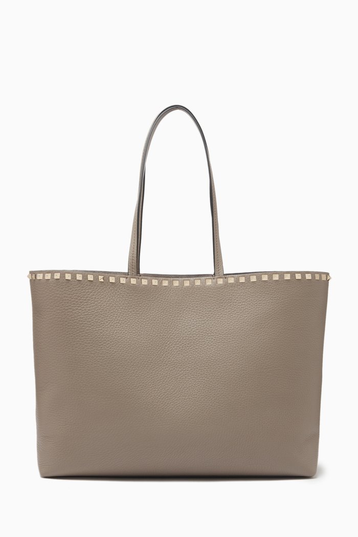 

Valentino Garavani Medium Grainy Rockstud Tote Bag in Leather, Grey