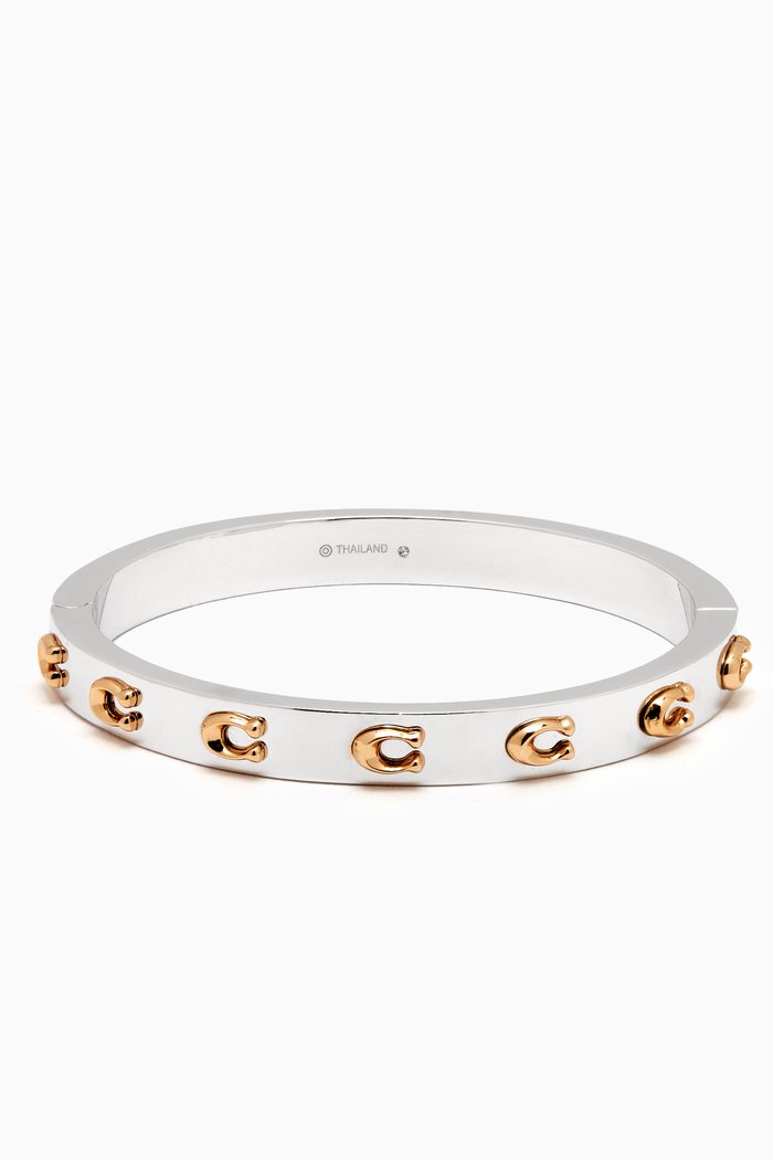 

Signature C Hinged Bangle in Metal, Multicolour