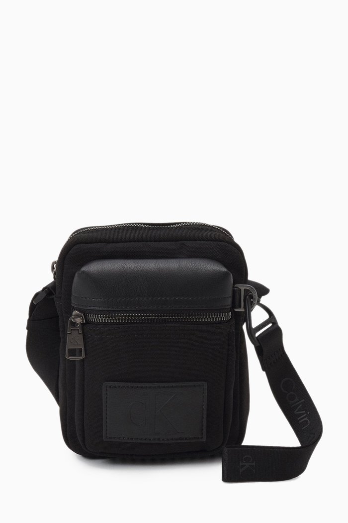 

Tagged Reporter Bag in Faux Leather, Black