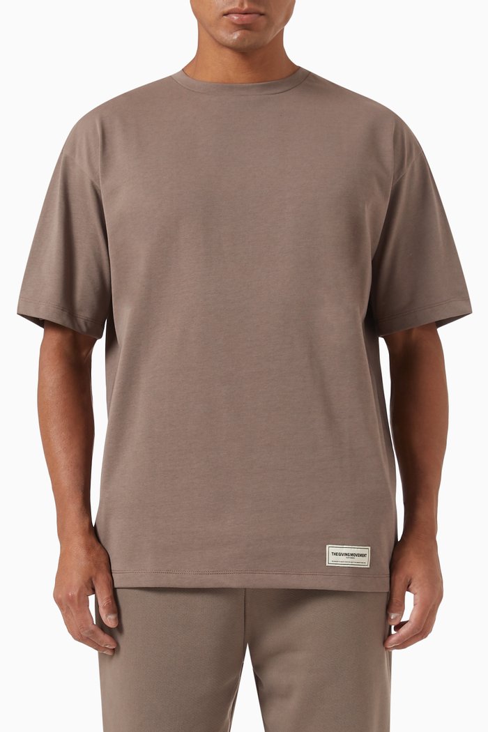 

Oversized Graphic Logo-print T-shirt in Cottonsey100©, Brown