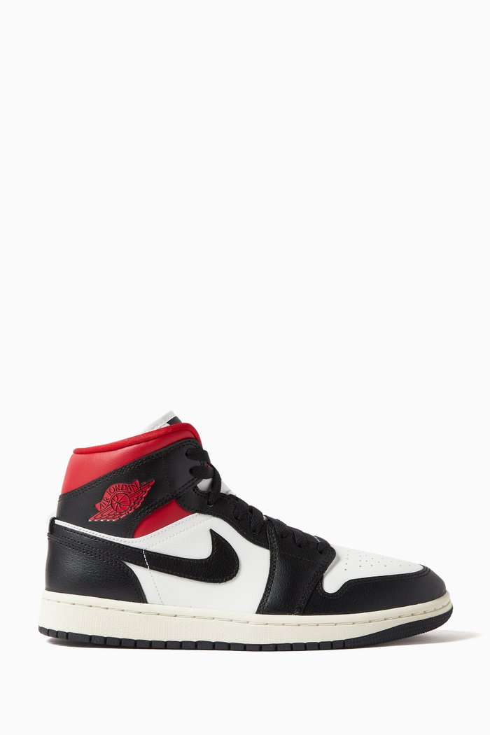 

Air Jordan 1 Mid-top Sneakers in Leather, Black