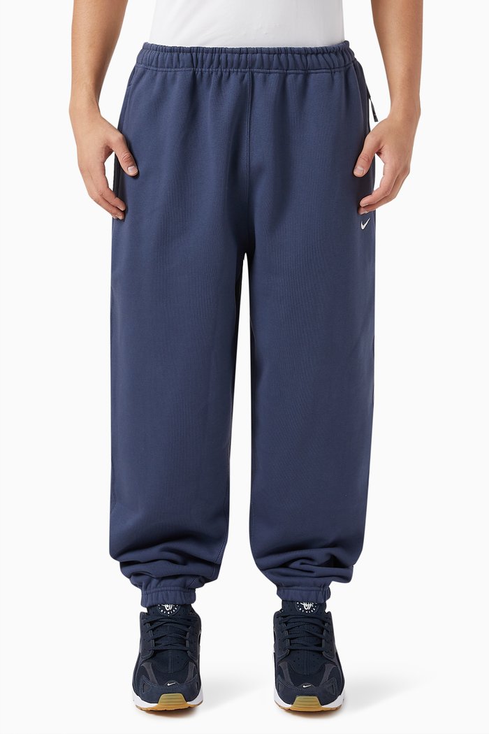 

Nike Solo Swoosh Trousers in Cotton-blend Fleece, Blue