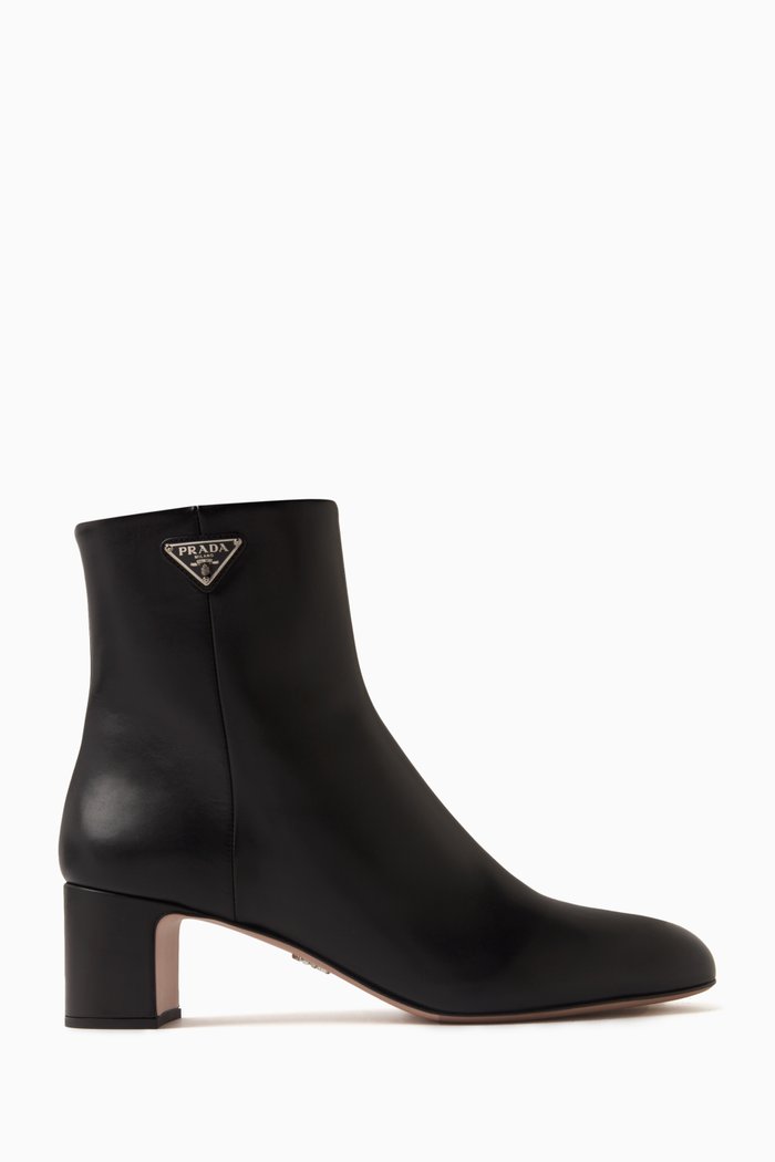 

Triangle Logo 55 Ankle-length Boots in Leather, Black