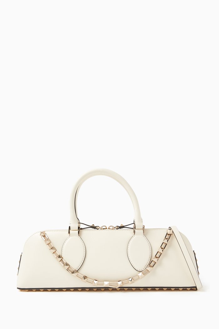 

Valentino Garavani Rockstud E/W Duffle Bag in Leather, Neutral