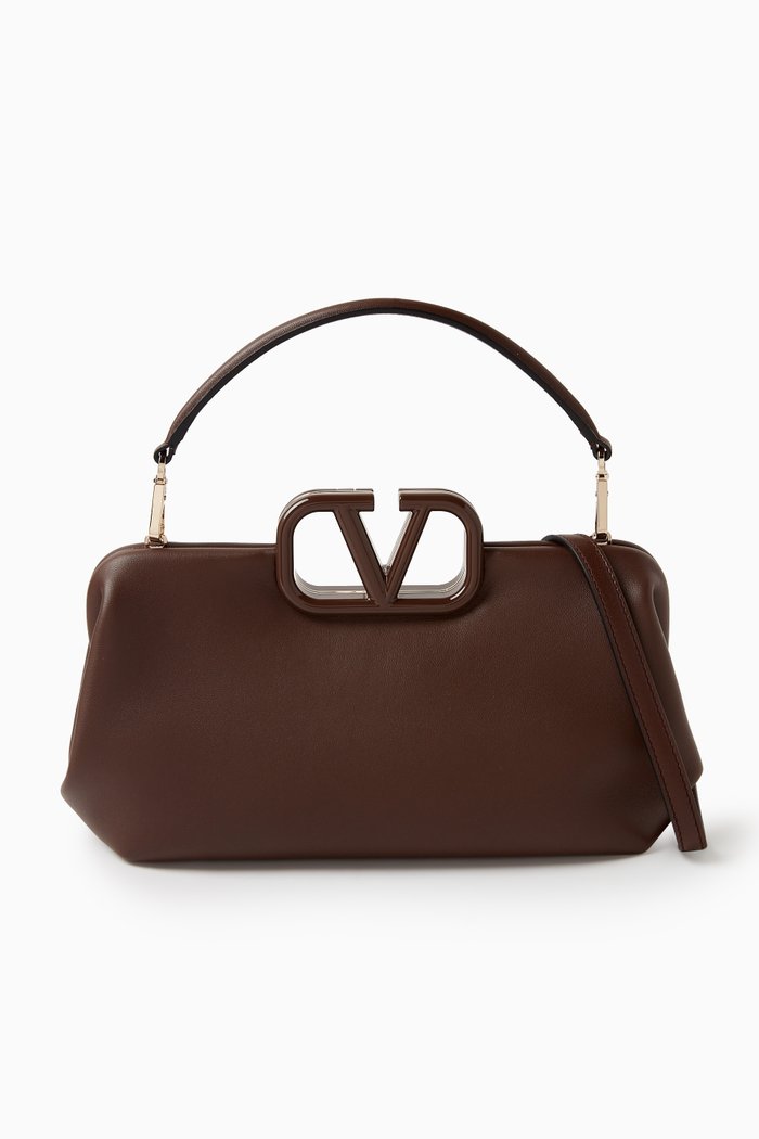 

Valentino Garavani’s Small VLOGO Clutch Bag in Nappa, Brown