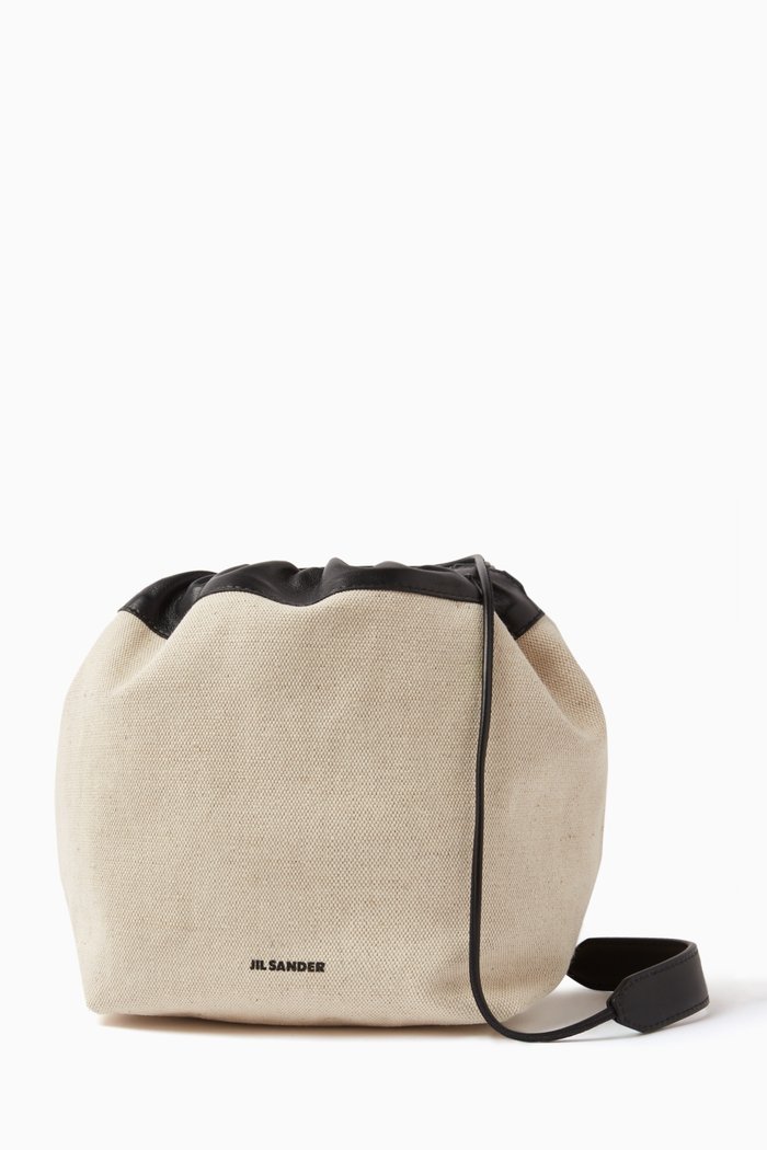 

Dumpling Drawstring Crossbody in Cotton-linen Canvas, Neutral