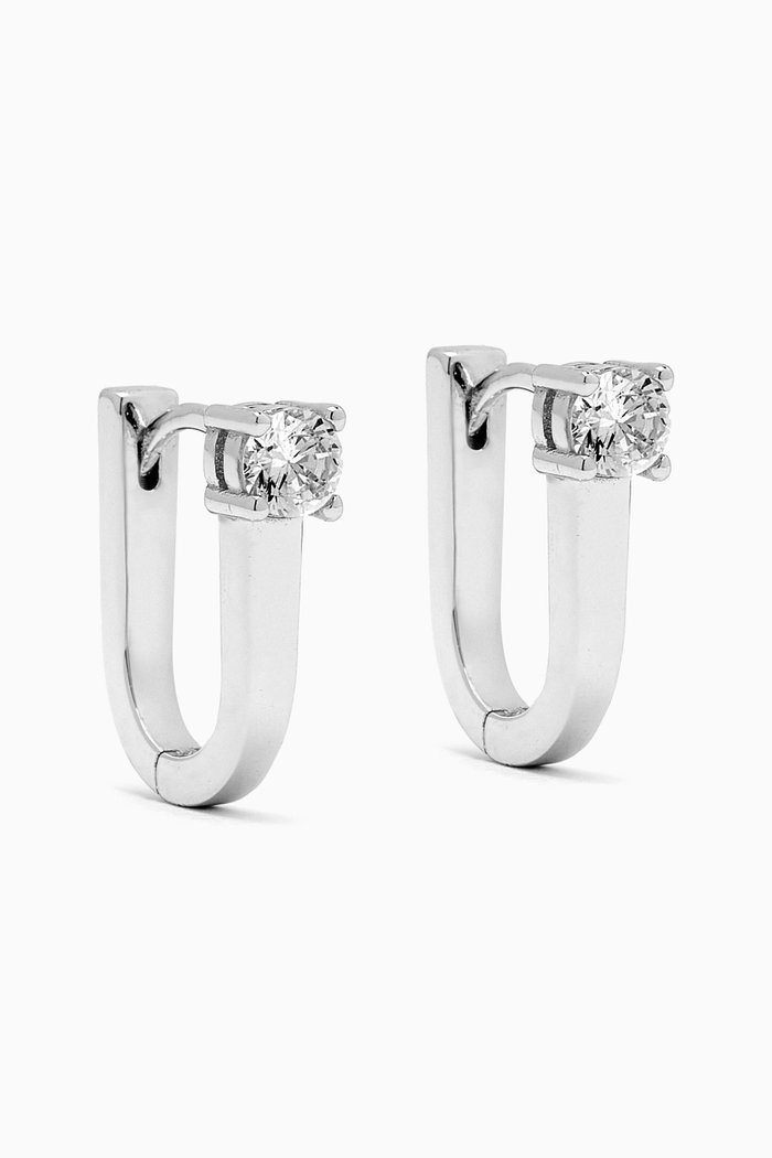 

CZ Solitaire Elongated Oval Shape Huggie Earrings in 14kt White Gold-plated Silver
