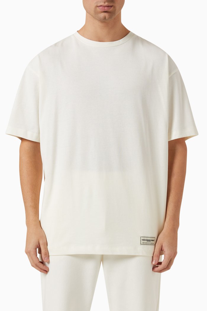 

Oversized UAE-print T-shirt in COTTONSEY100©, Neutral