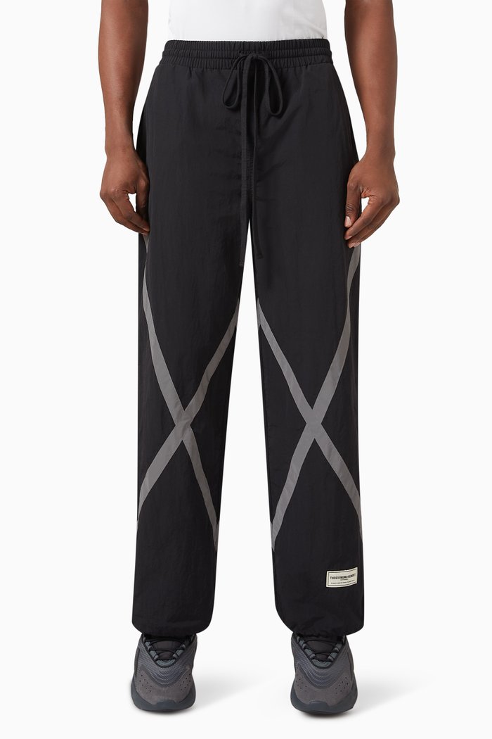 

Reflective-strips Wide-leg Pants in RE-SHELL100©, Black