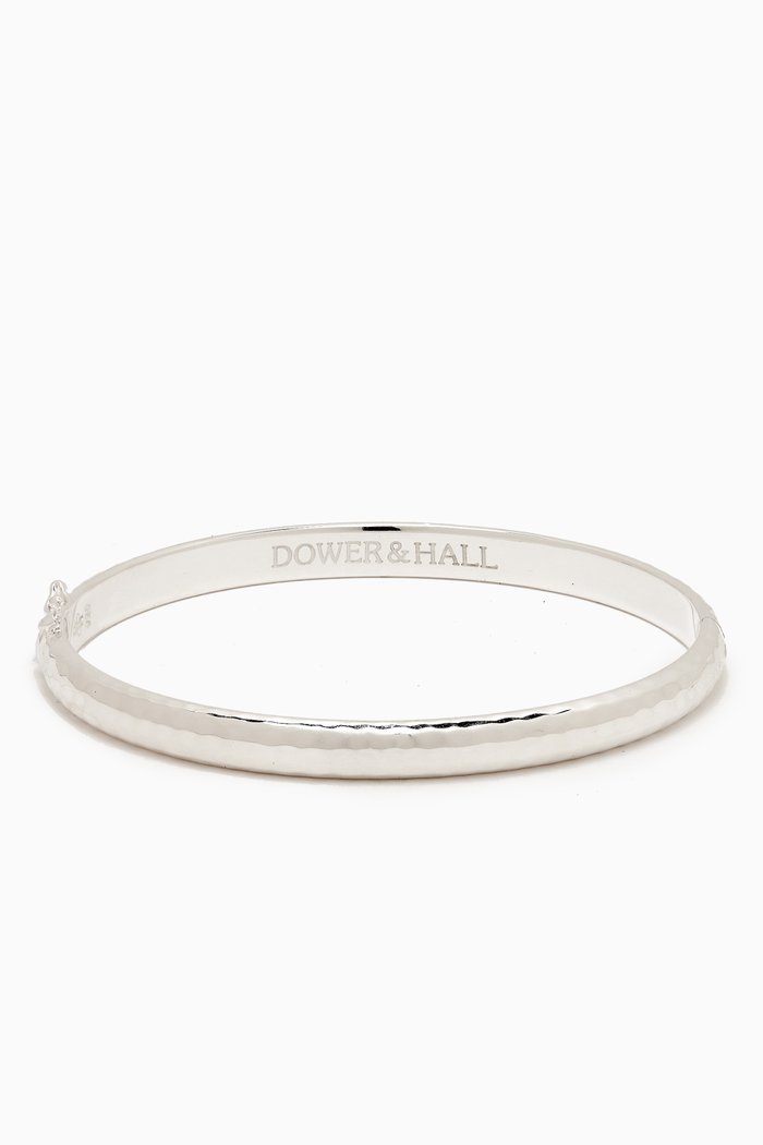 

Hinged Hammered Nomad Bangle in Sterling Silver