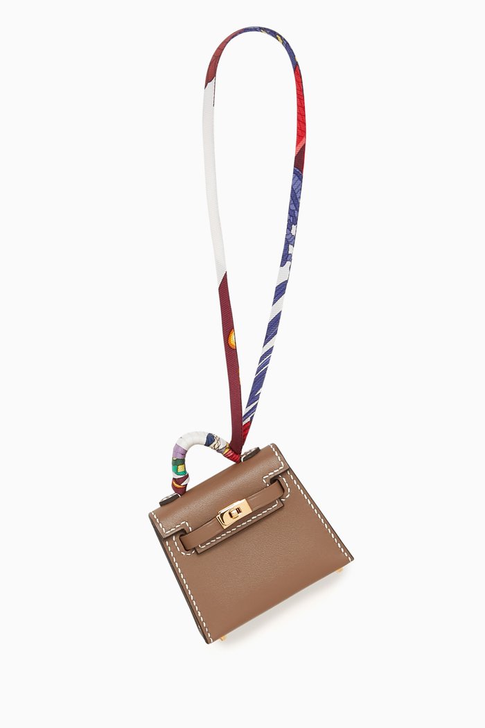 

Unused Micro Mini Kelly Twilly Bag Charm in Leather & Gold Hardware, Brown