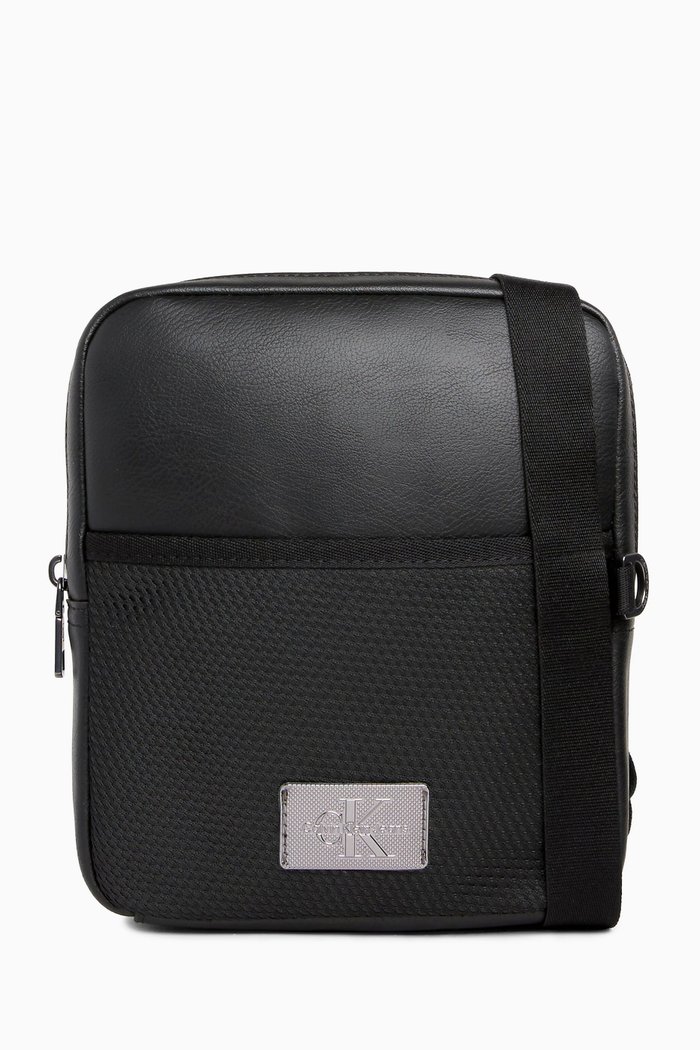 

Tagged Reporter Bag in Faux Leather, Black