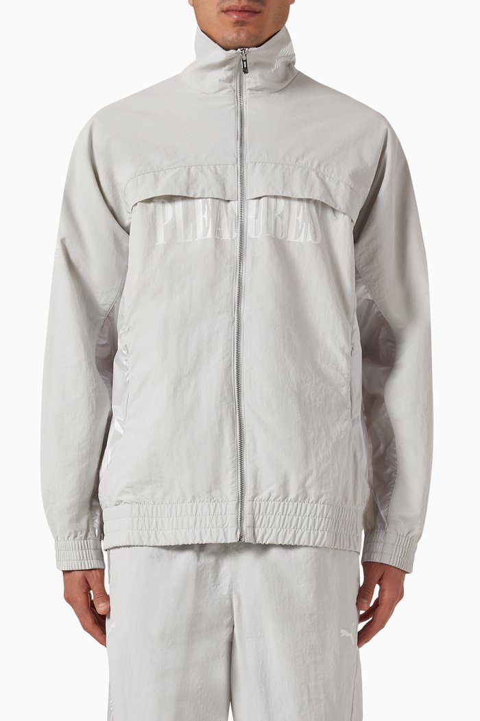 

x Pleasures Logo Cellerator Track Jacket in Recycled Nylon, Grey