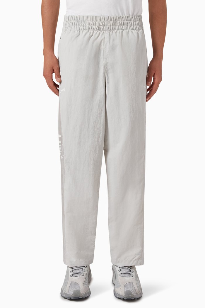 

x Pleasures Logo Cellerator Track Pants in Recycled Nylon, Grey