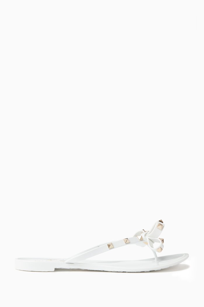 Valentino Garavani Rockstud Flat Sandals in PVC, White