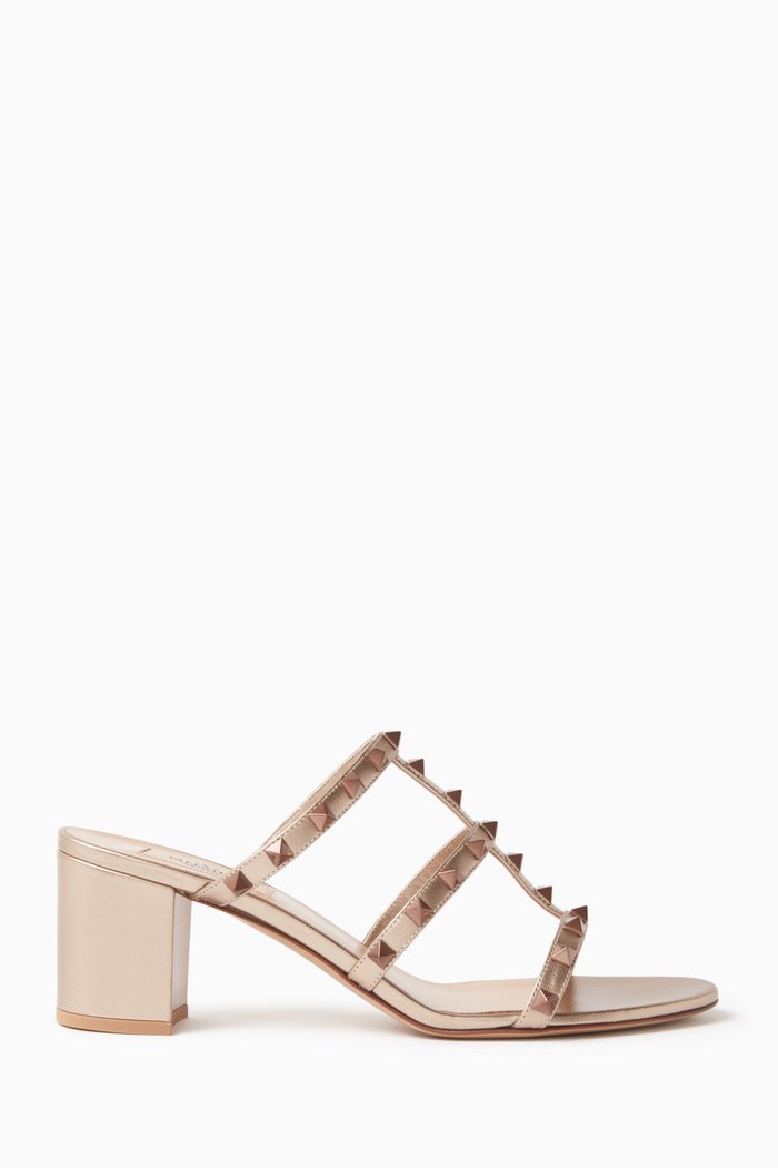 

Valentino Garavani Rockstud Metallic Mules in Leather, Neutral