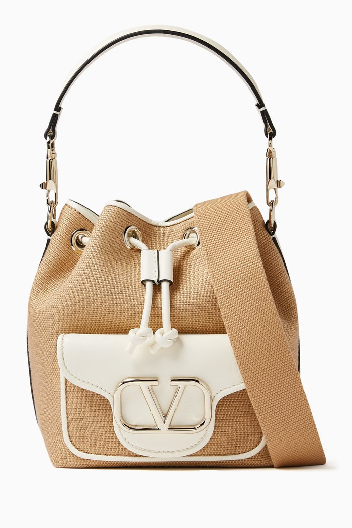 

Valentino Garavani Small VLOGO Signature Drawstring Bag in Raffia, Neutral