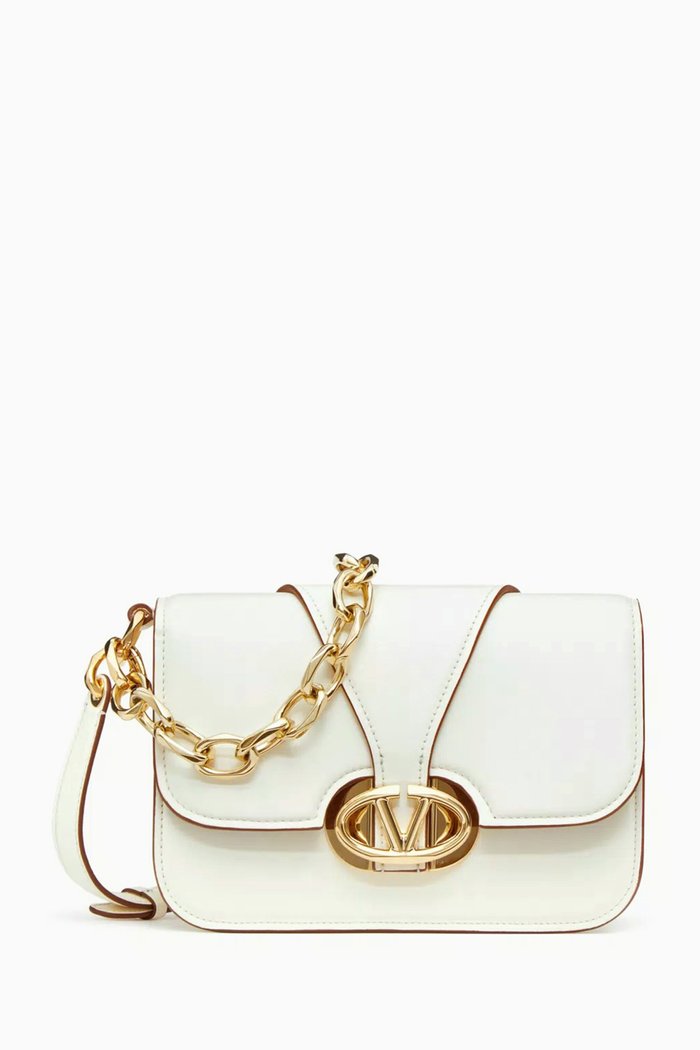 

Valentino Garavani Small Vlogo Moon Shoulder Bag in Nappa, Neutral
