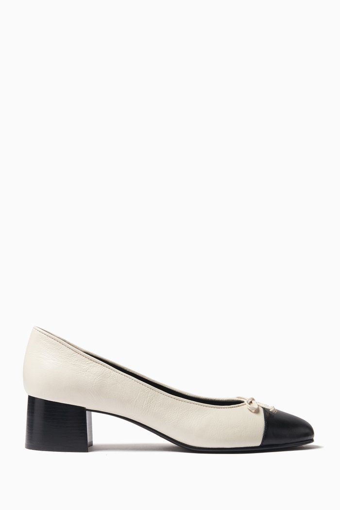 

Cap-toe Pumps in Leather, Neutral
