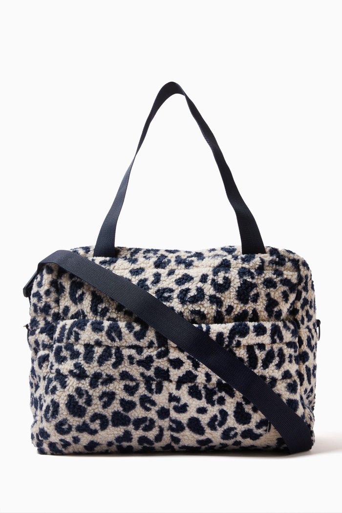 

Menza Changing Bag in Borg, Blue