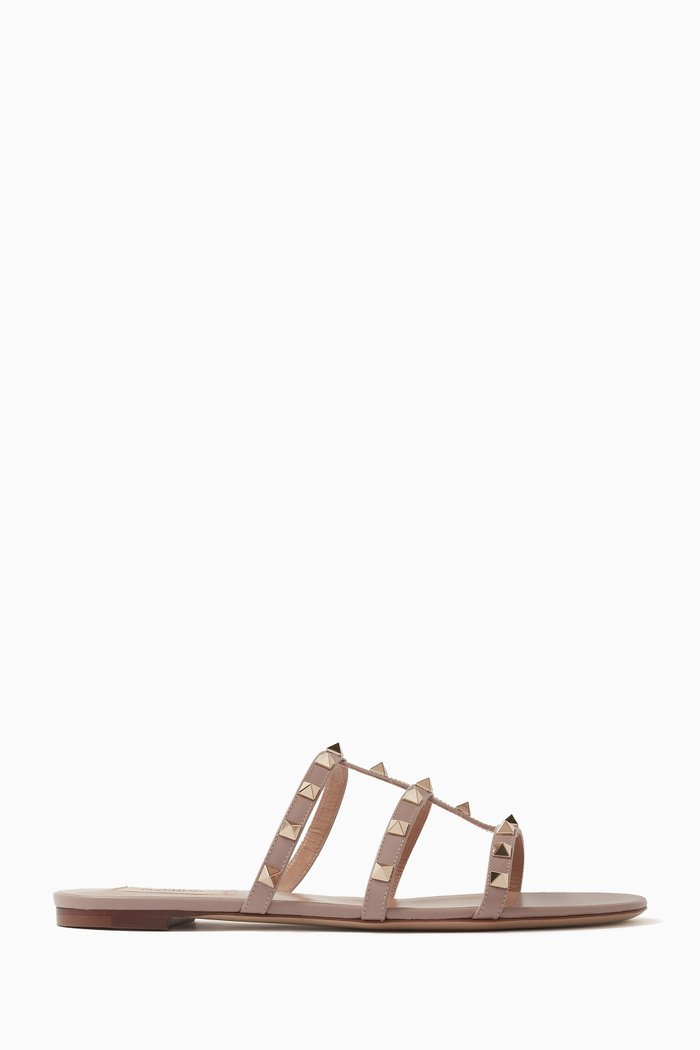 

Valentino Garavani Rockstud Slides in Leather, Neutral