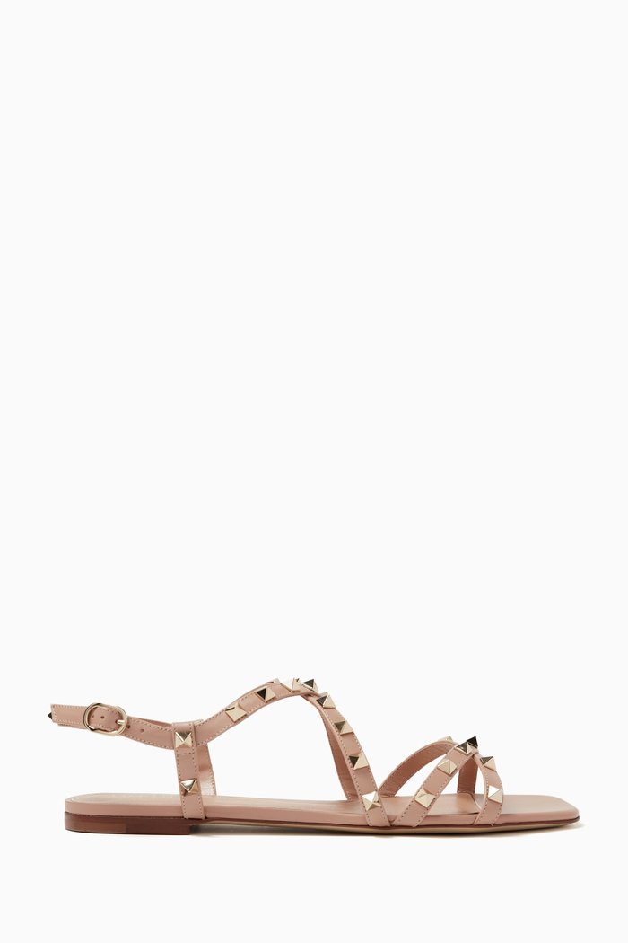 

Valentino Garavani Rockstud Strappy Flat Sandals in Calfskin, Pink