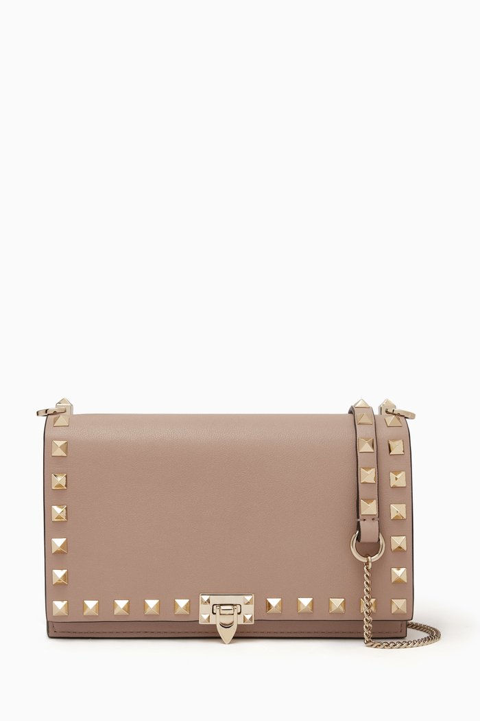 

Valentino Garavani Rockstud Crossbody Clutch in Leather, Neutral