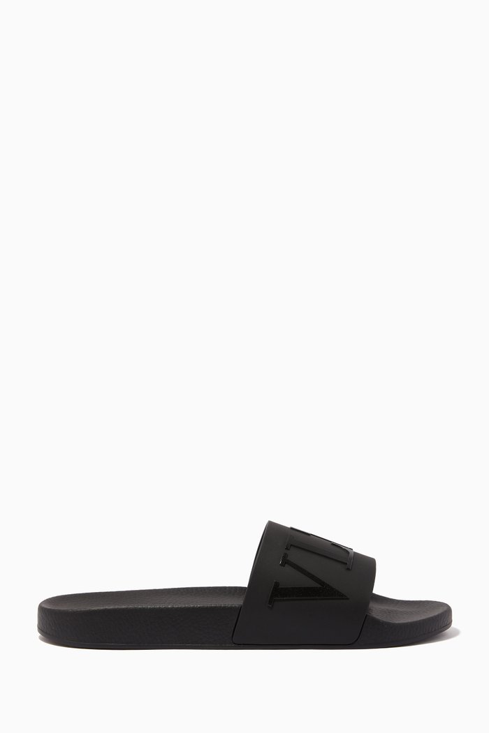 

Valentino Garavani Logo Slide Sandals in Rubber, Black